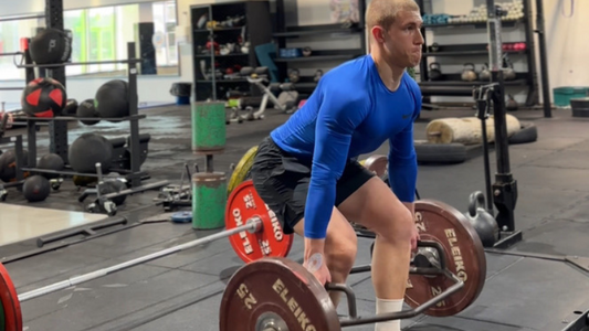 Split stance trap bar deadlift