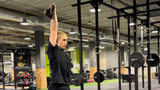 One arm clean press kettlebell